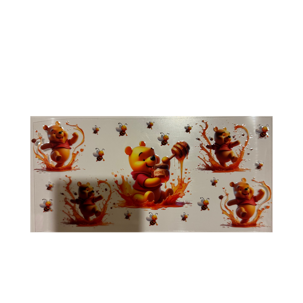 Pooh Playing in Honey