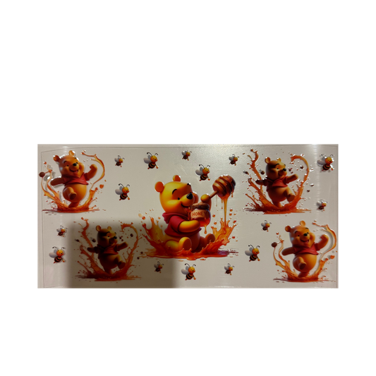 Pooh Playing in Honey